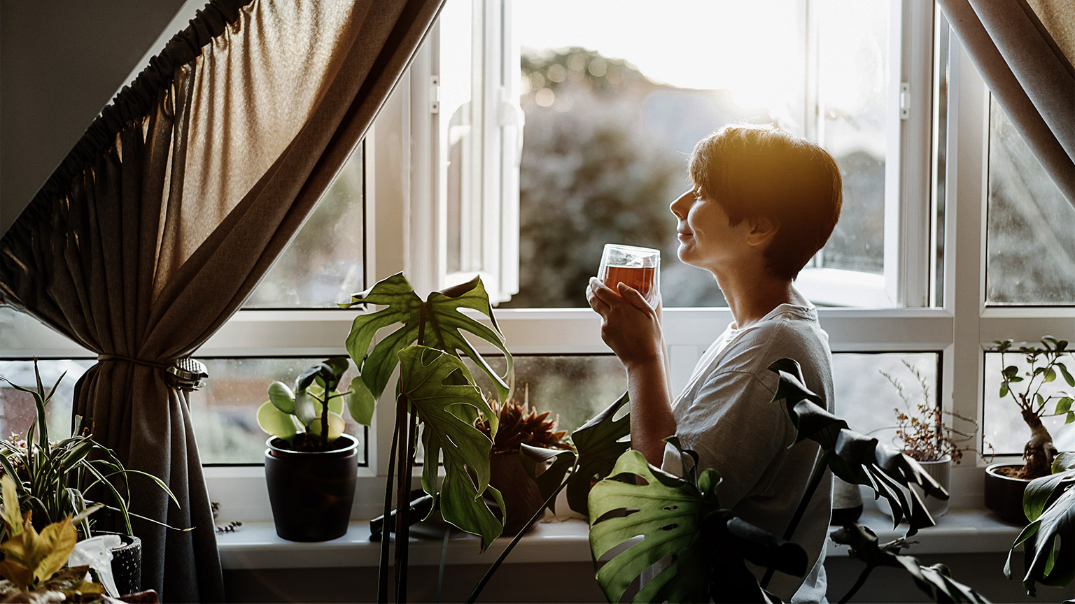 A person drinking tea in the morning