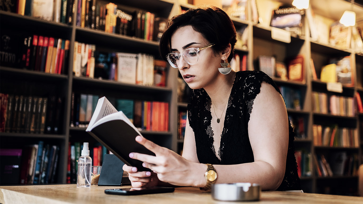 A person reading in a library