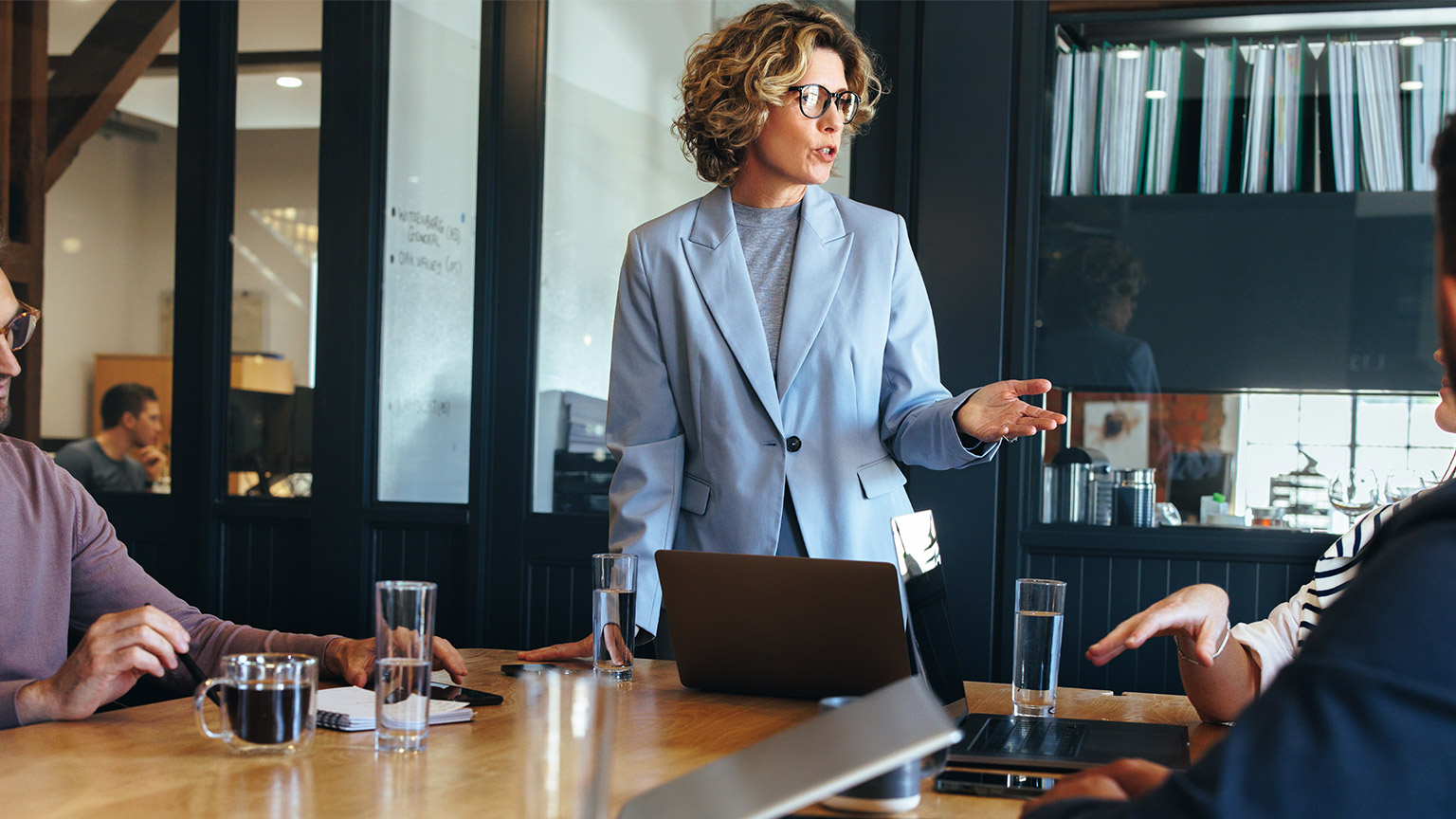 A manager leading a business meeting