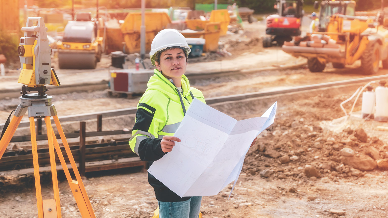 A surveyor on a work site