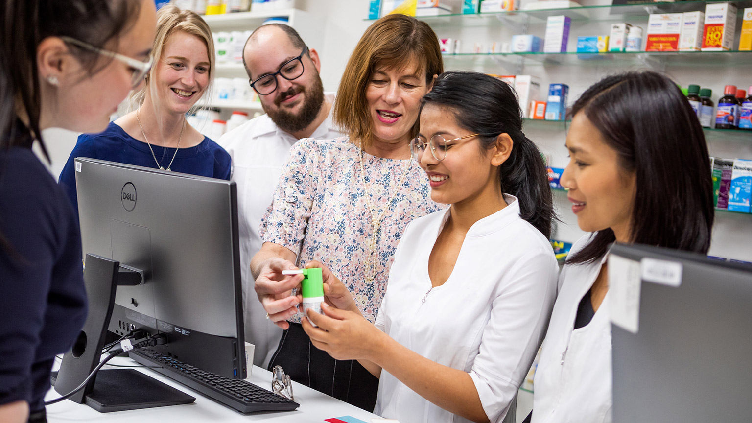 A group of students with a pharmacy teacher