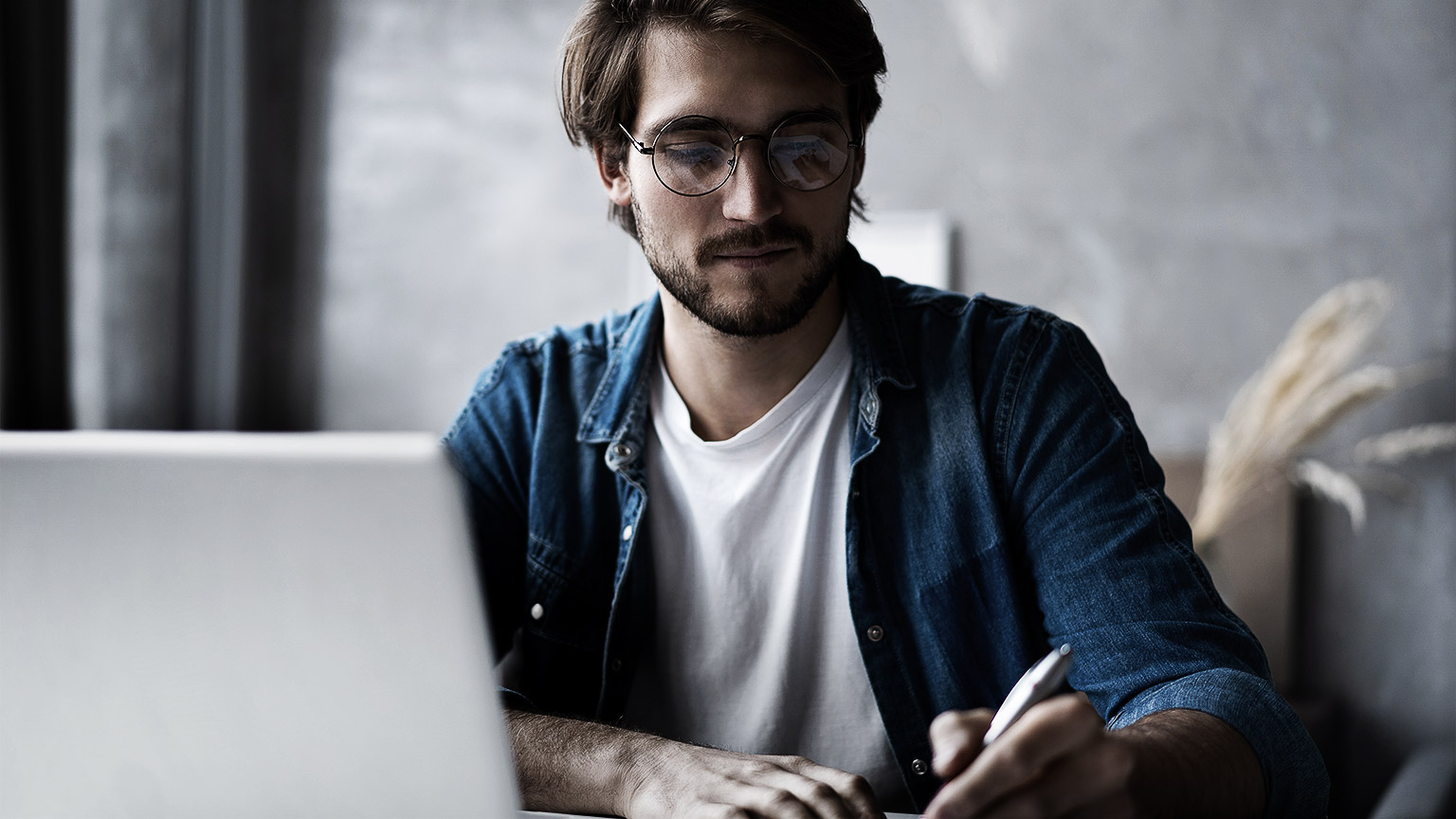 A person taking down notes