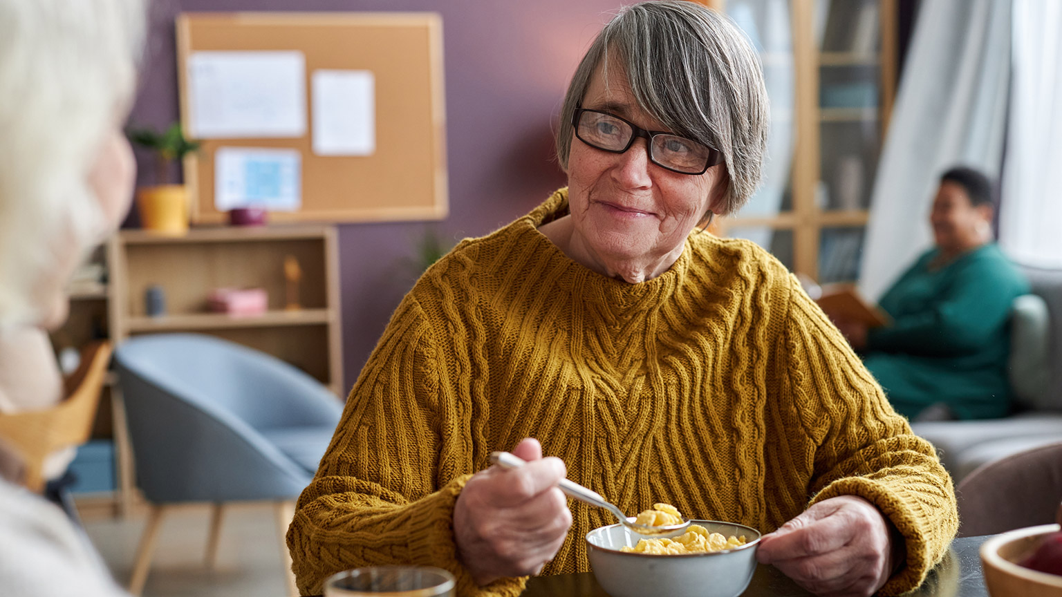 Several elderly people in an aged care facility