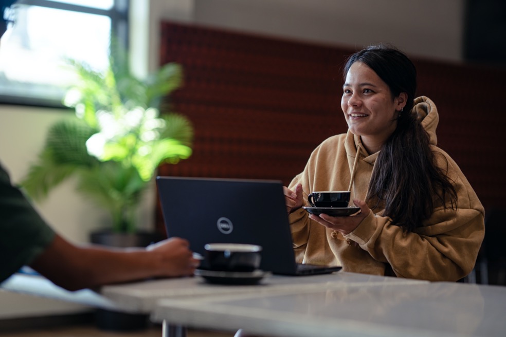 A student in a cafe setting