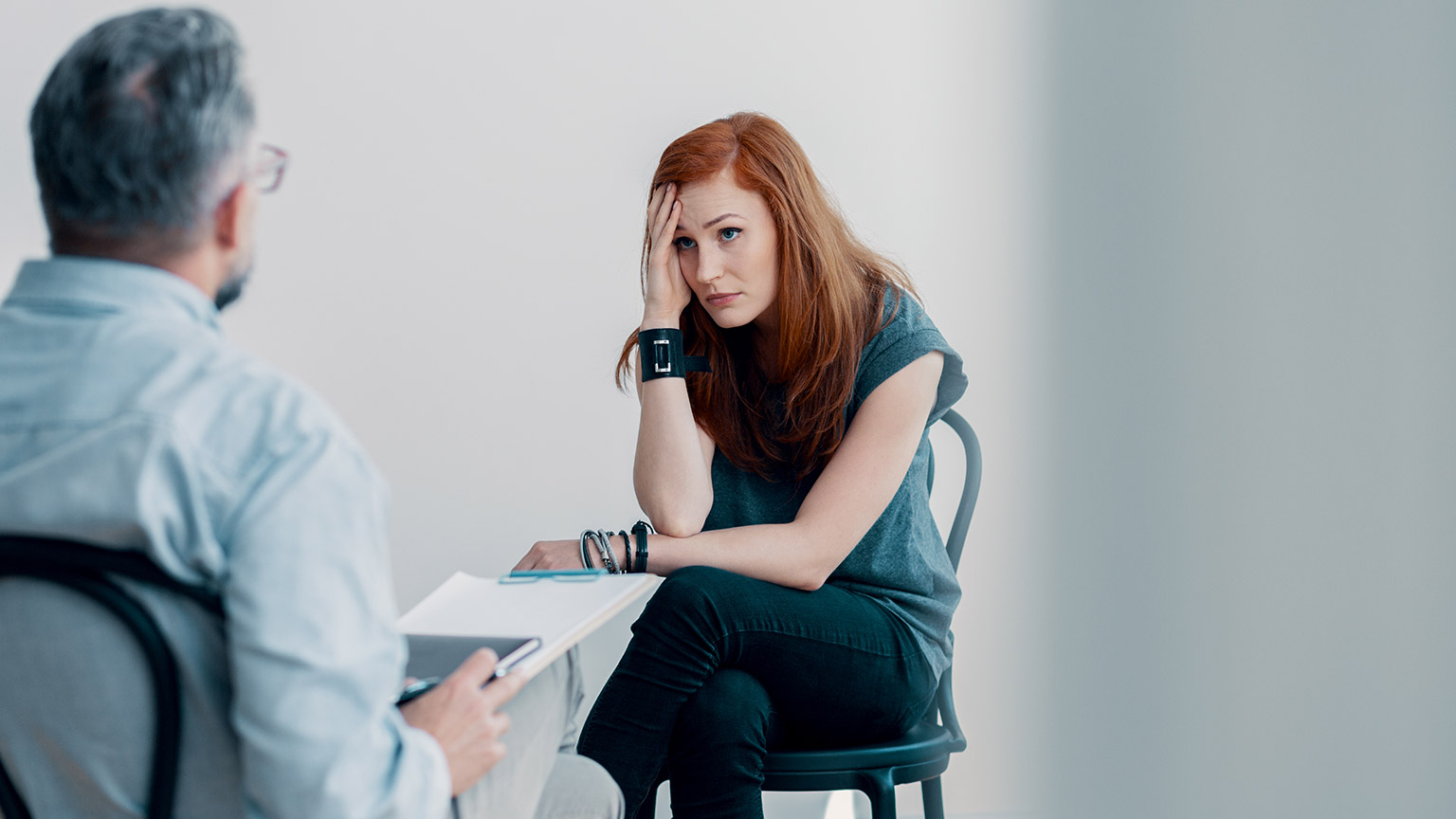 A counsellor talking to a client