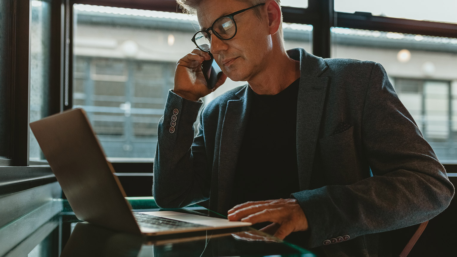 A person working on their computer in an office