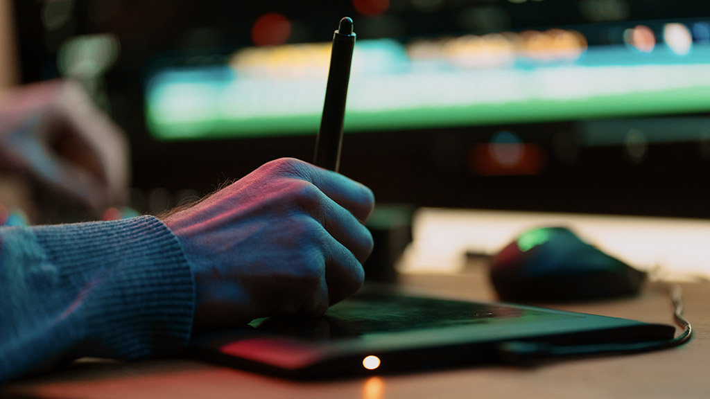  Editor hand Works with Footage or Video on His graphic panel of Personal Computer