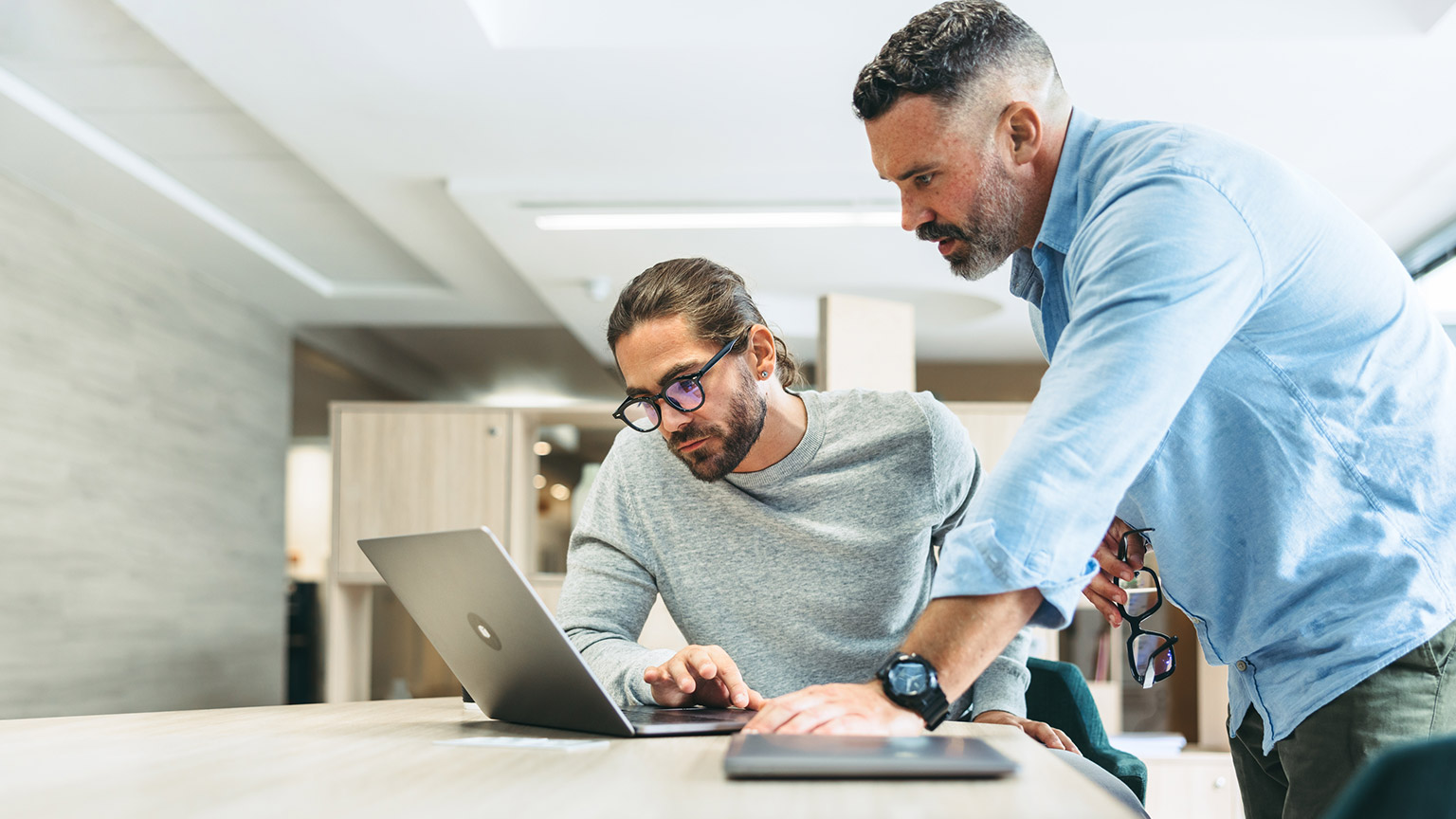 2 colleagues working on a business plan