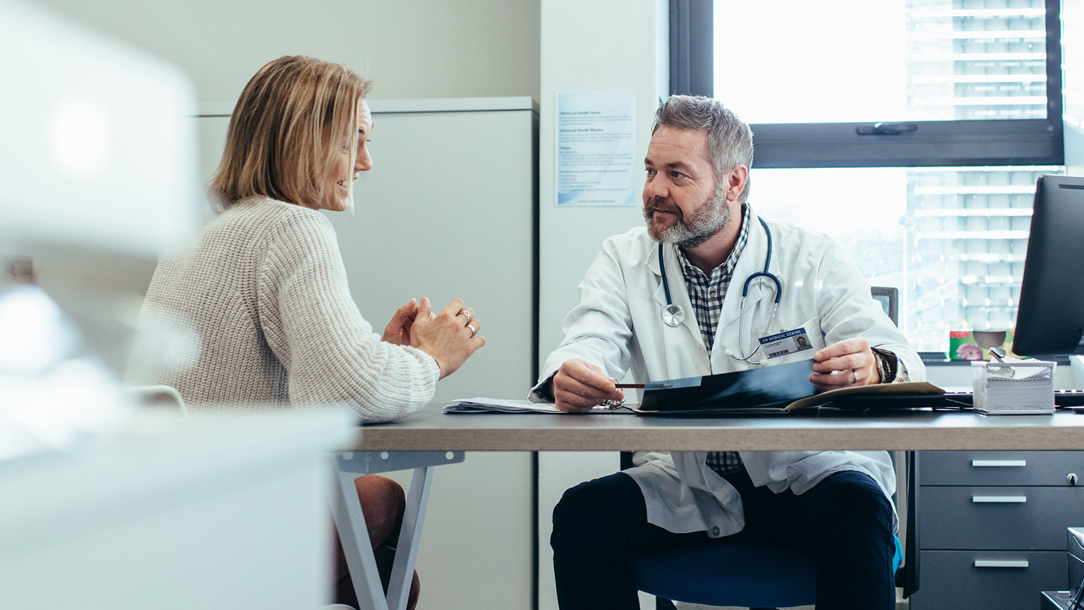 A doctor and patient talking