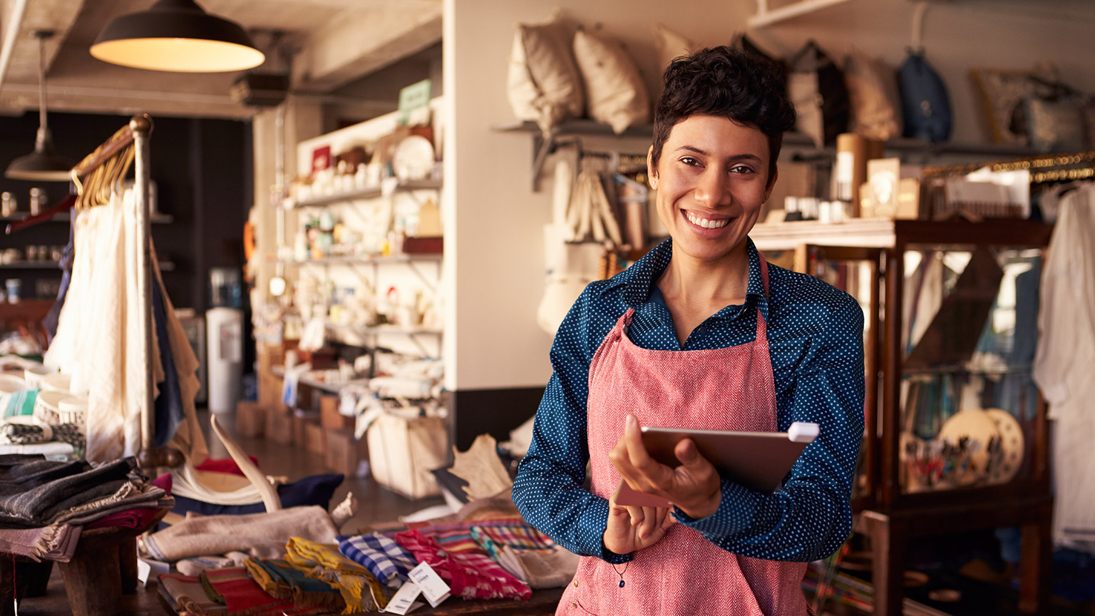 A small business owner in her store