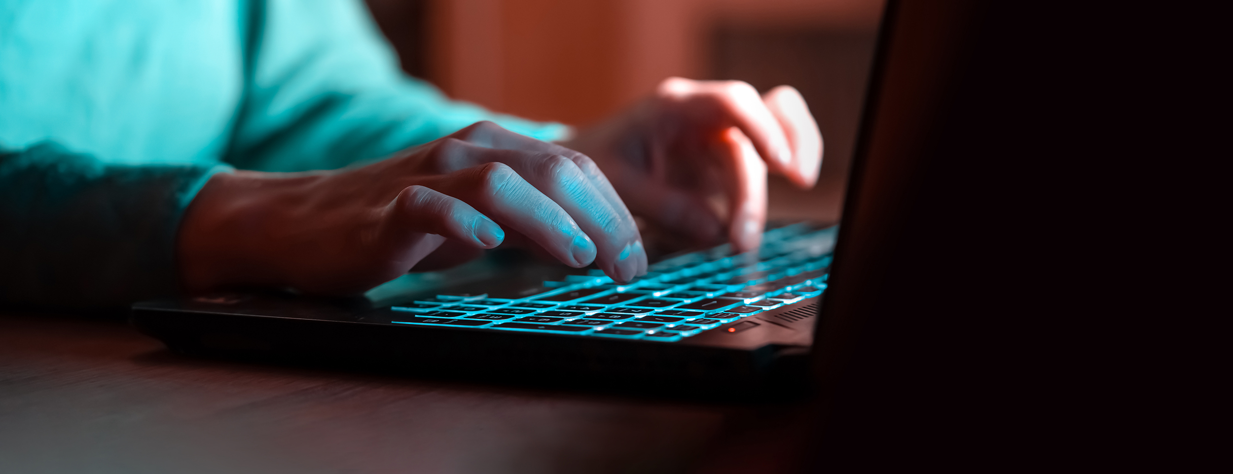 A close view of a person typing on a keyboard