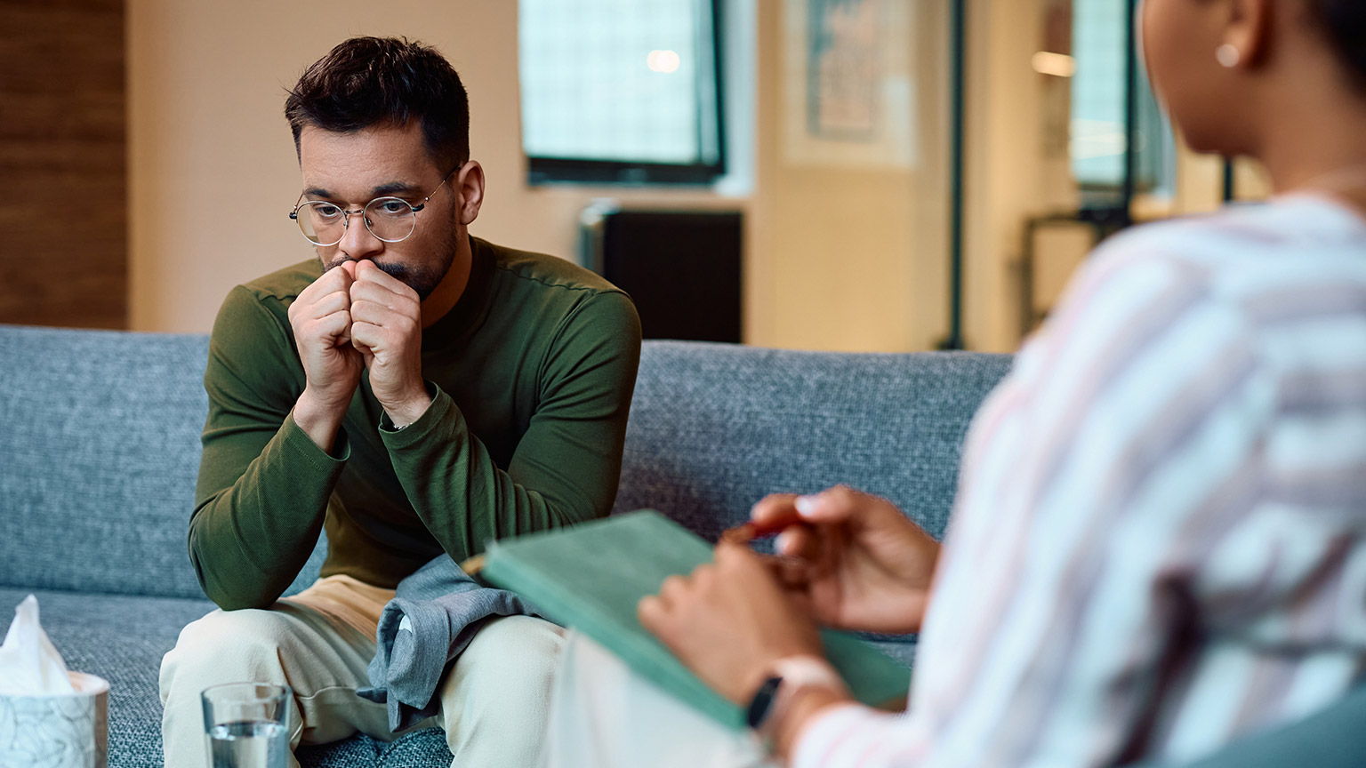 A counsellor talking to a client