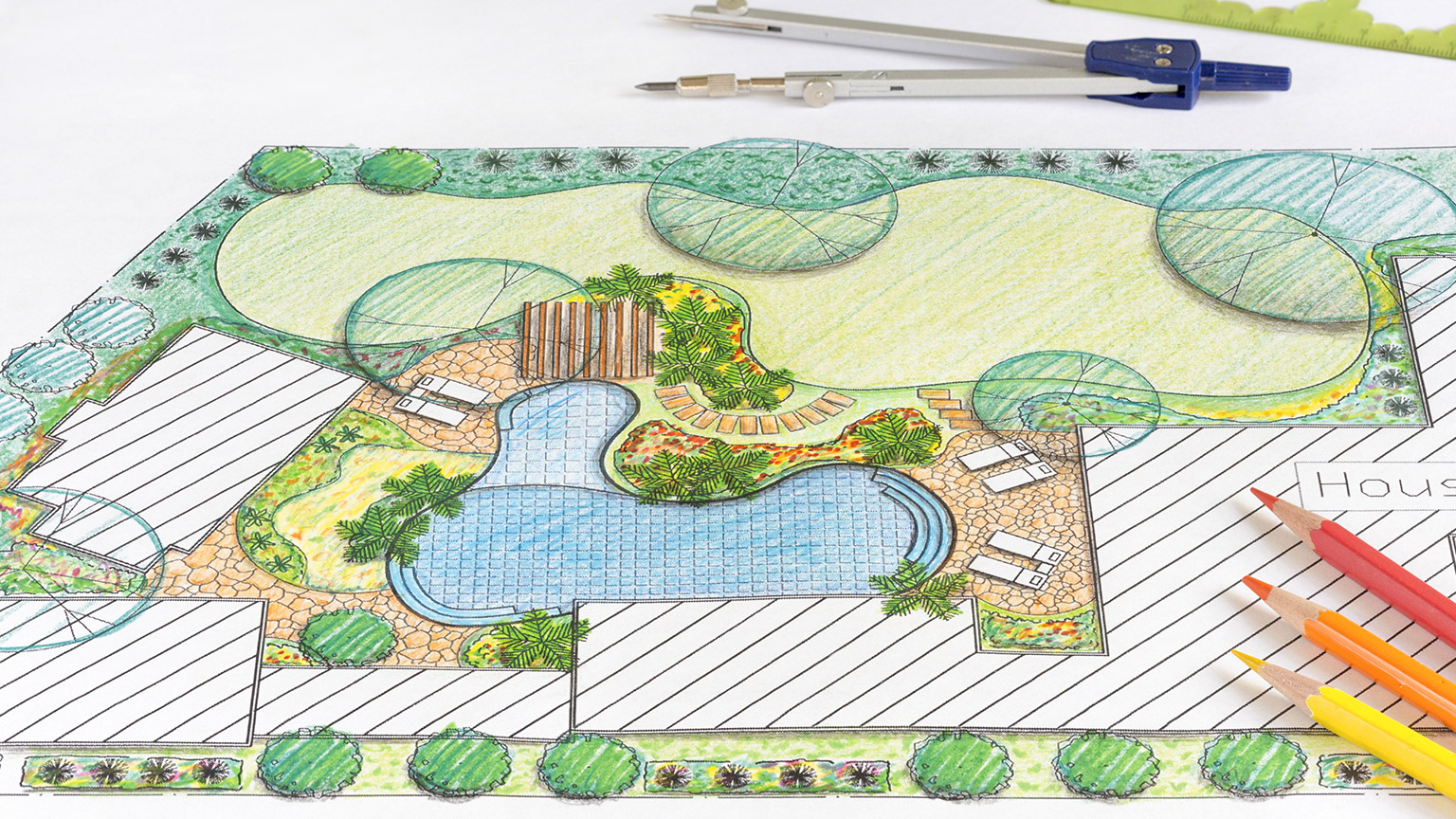 Architectural design in colored pencils of a backyard plan for a villa