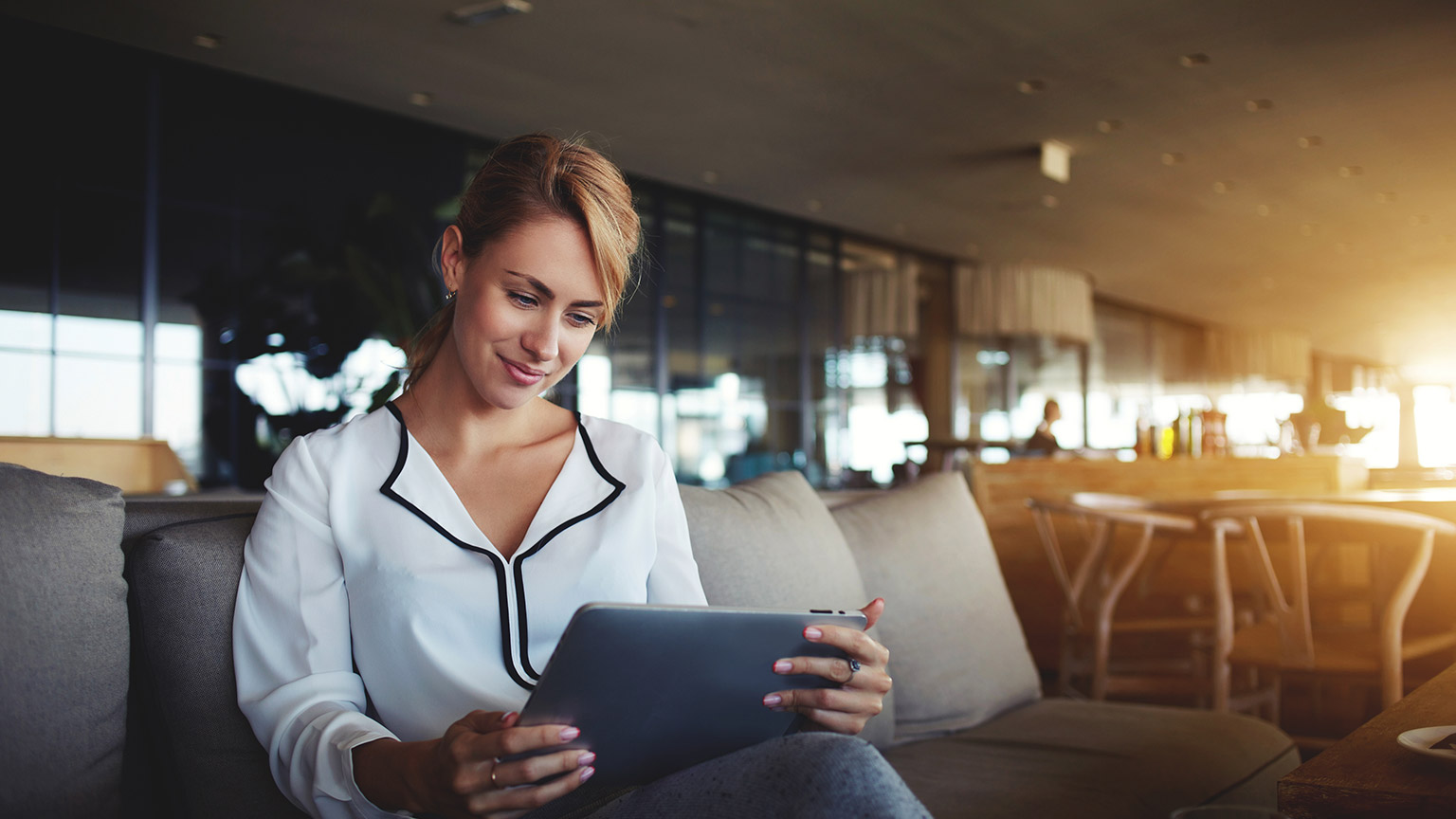 A person reading information from a laptop