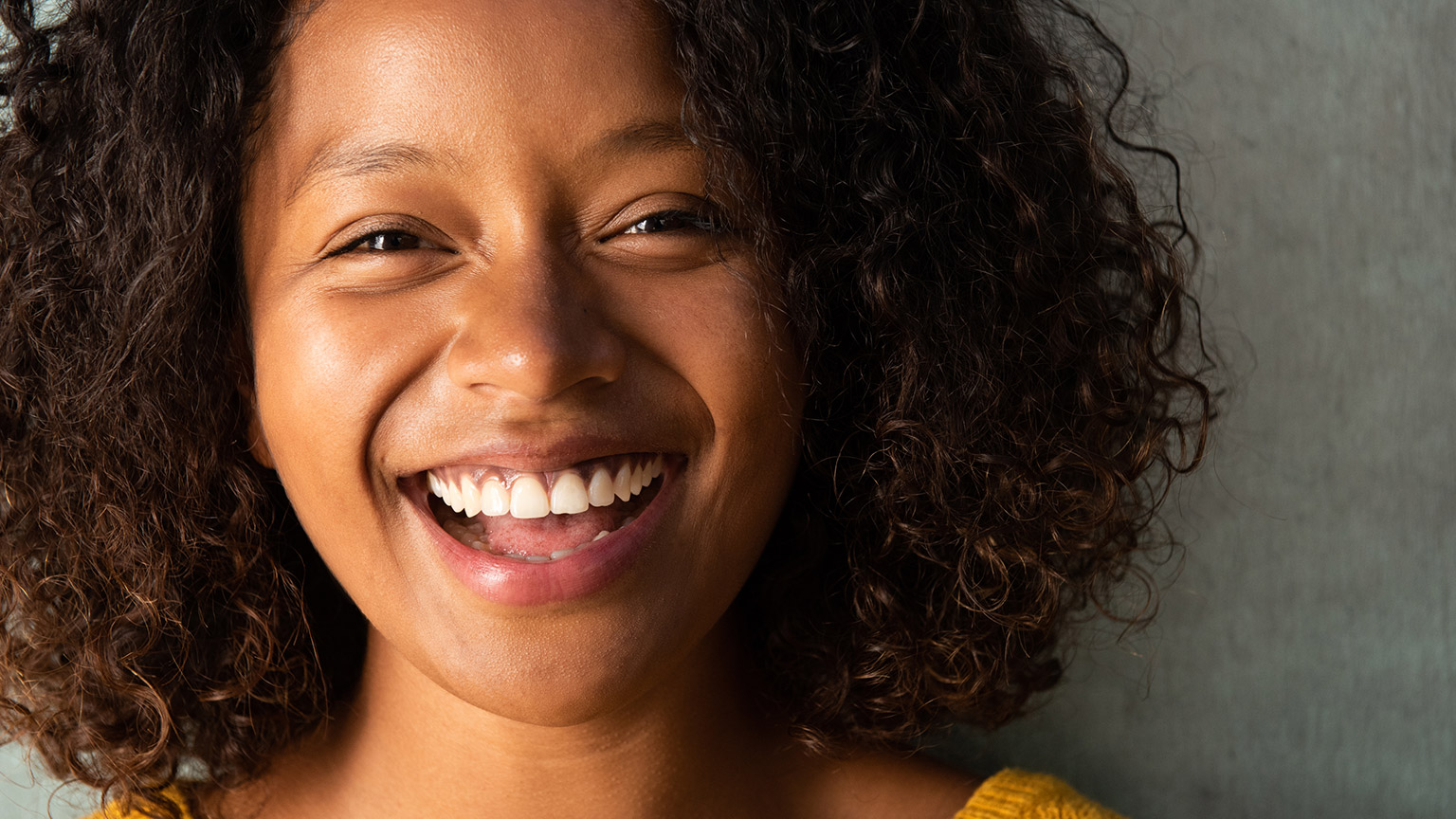 A person smiling at the camera