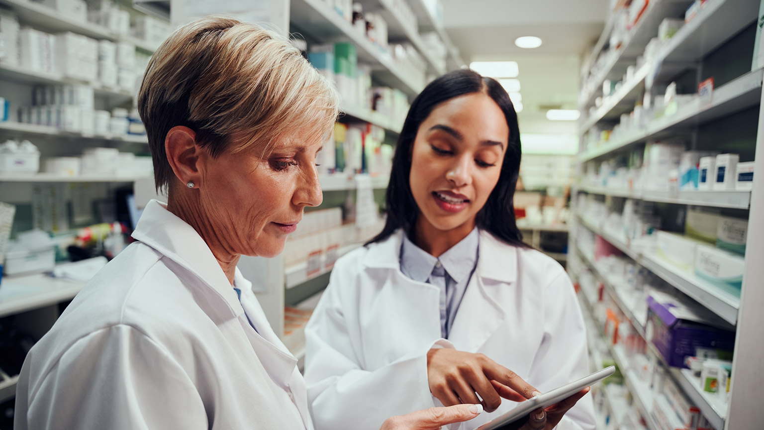 Two pharmacists talking to each other