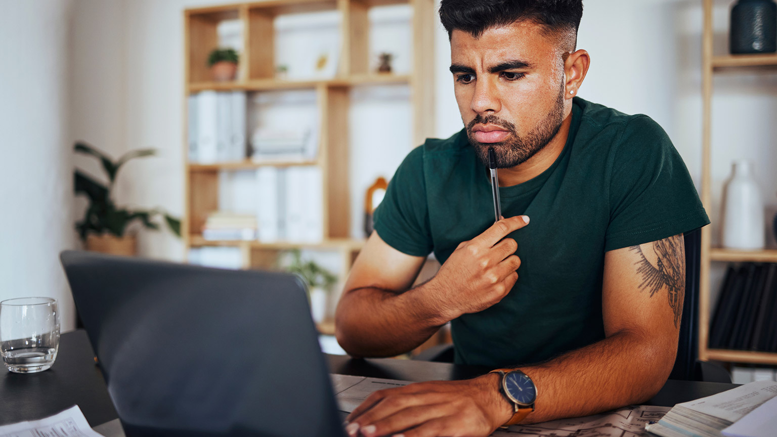 A person reading information from a laptop