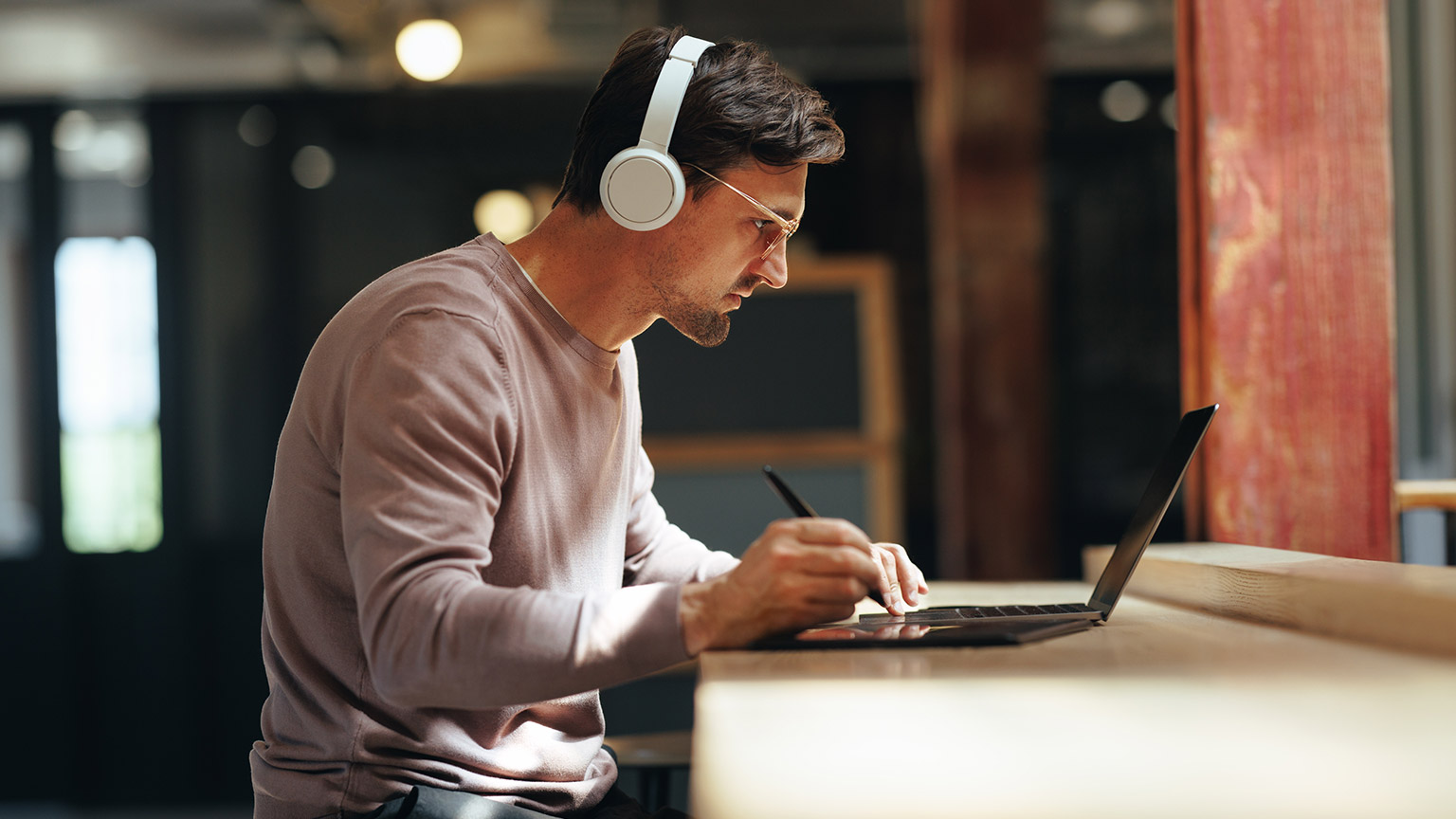 A person using technology in a modern office