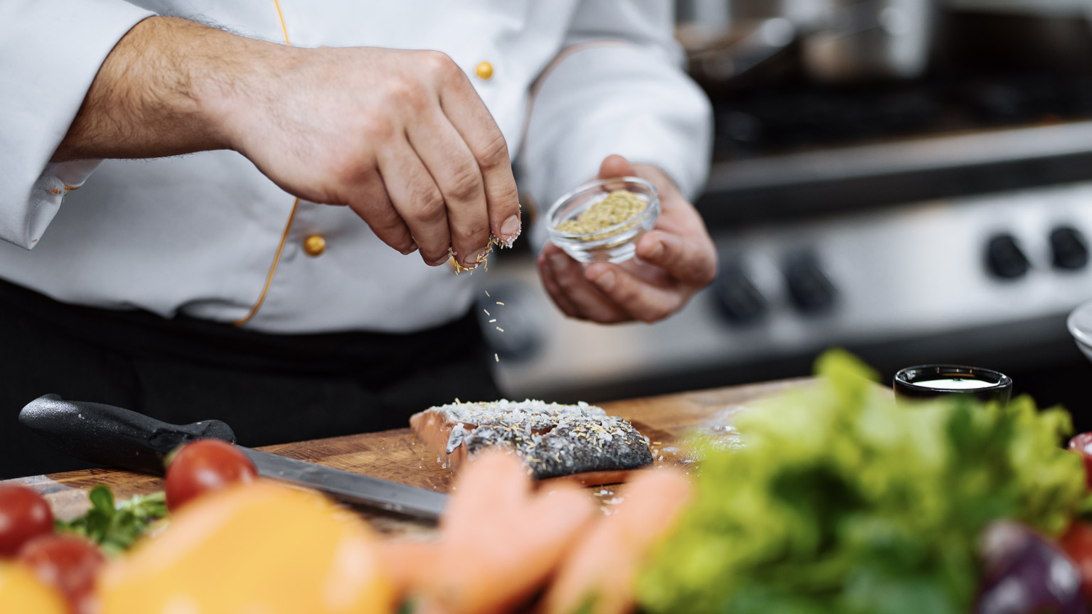 Chef preparing salmon