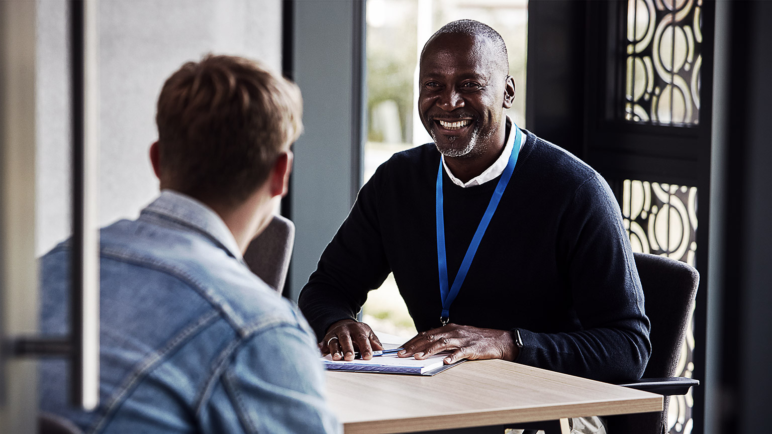 a person meeting with counselor