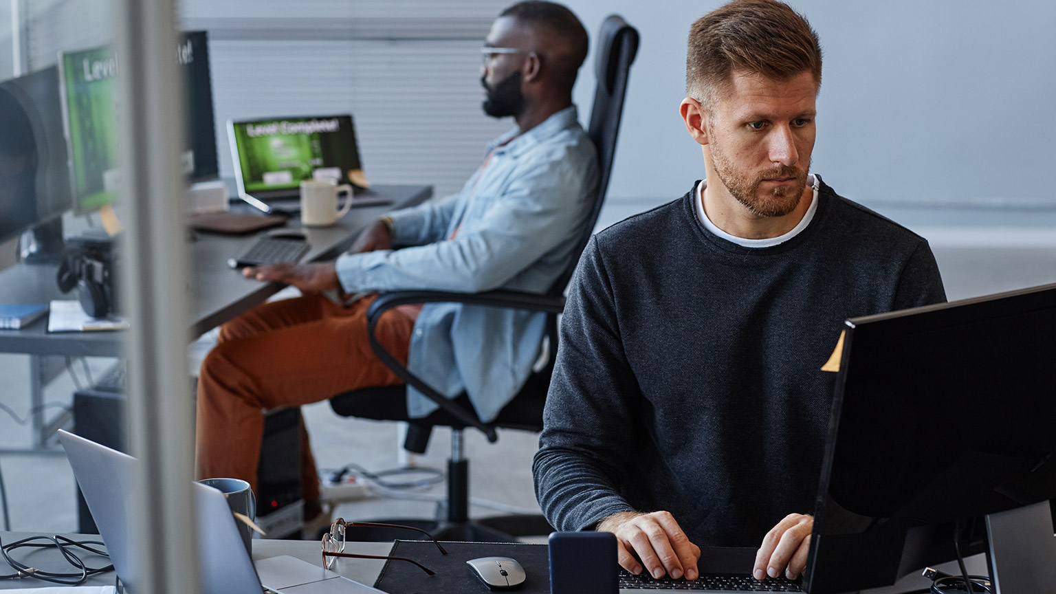 A group of employees working in an office