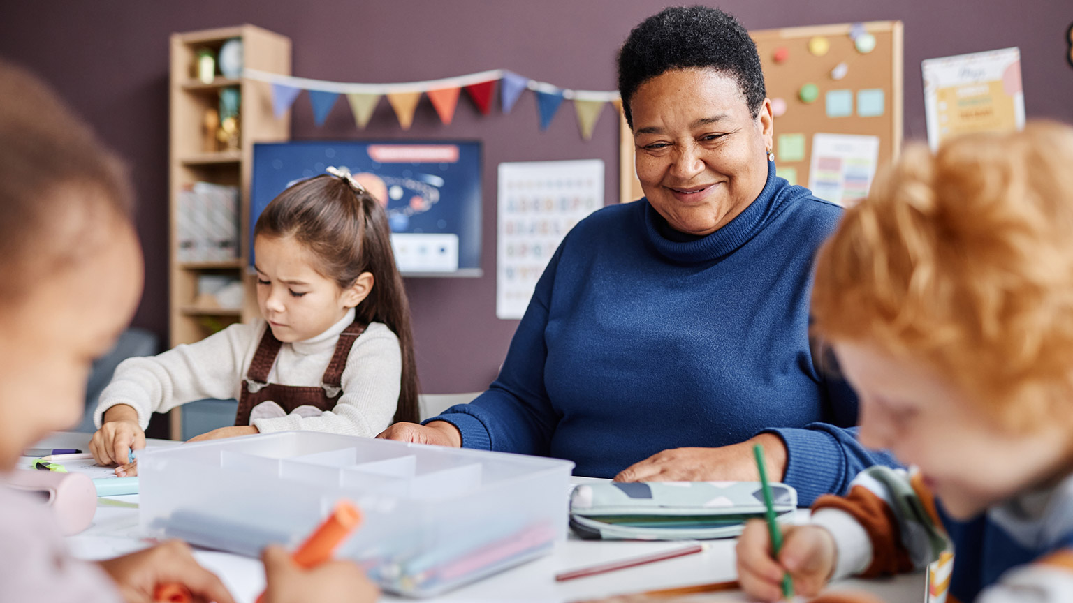 A teacher with a class of students