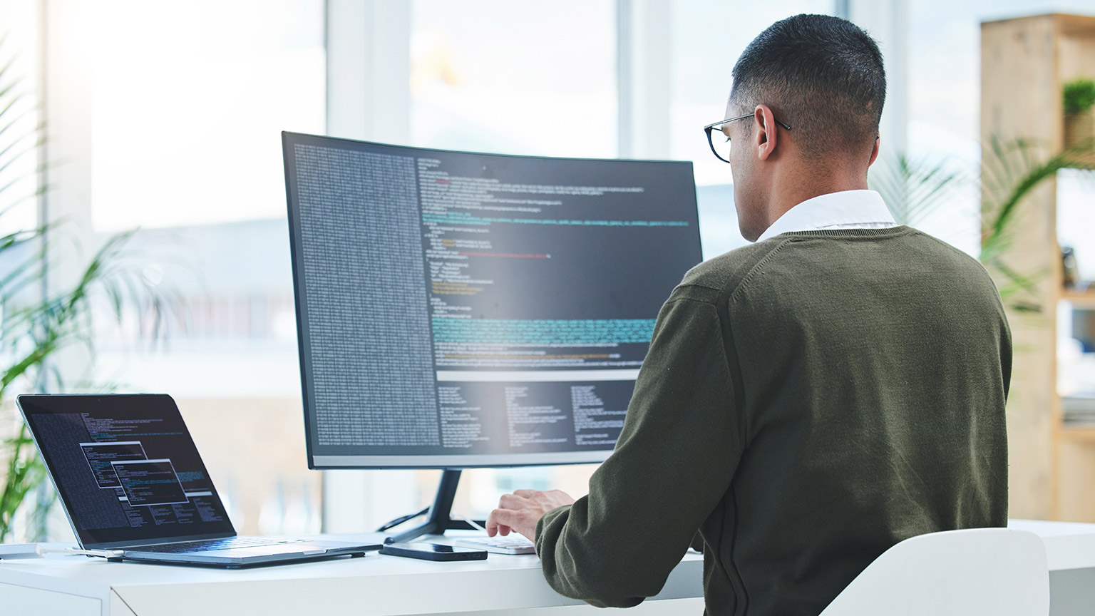 A person working on IT stuff in an office