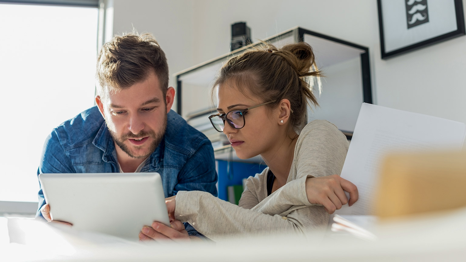 two business owners brainstorming their plans with small business