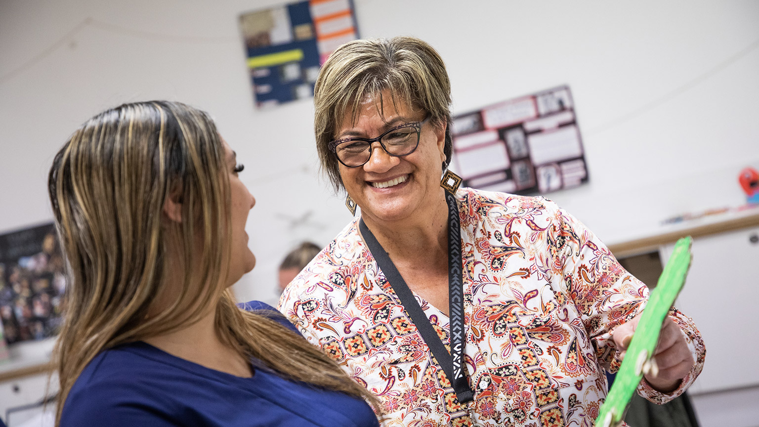 A teacher talking to a student