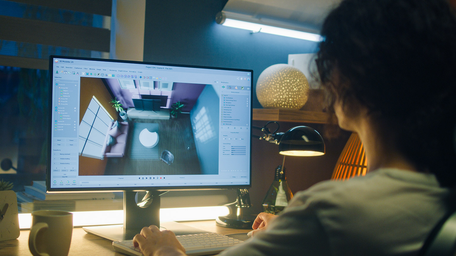 A designer working on a computer