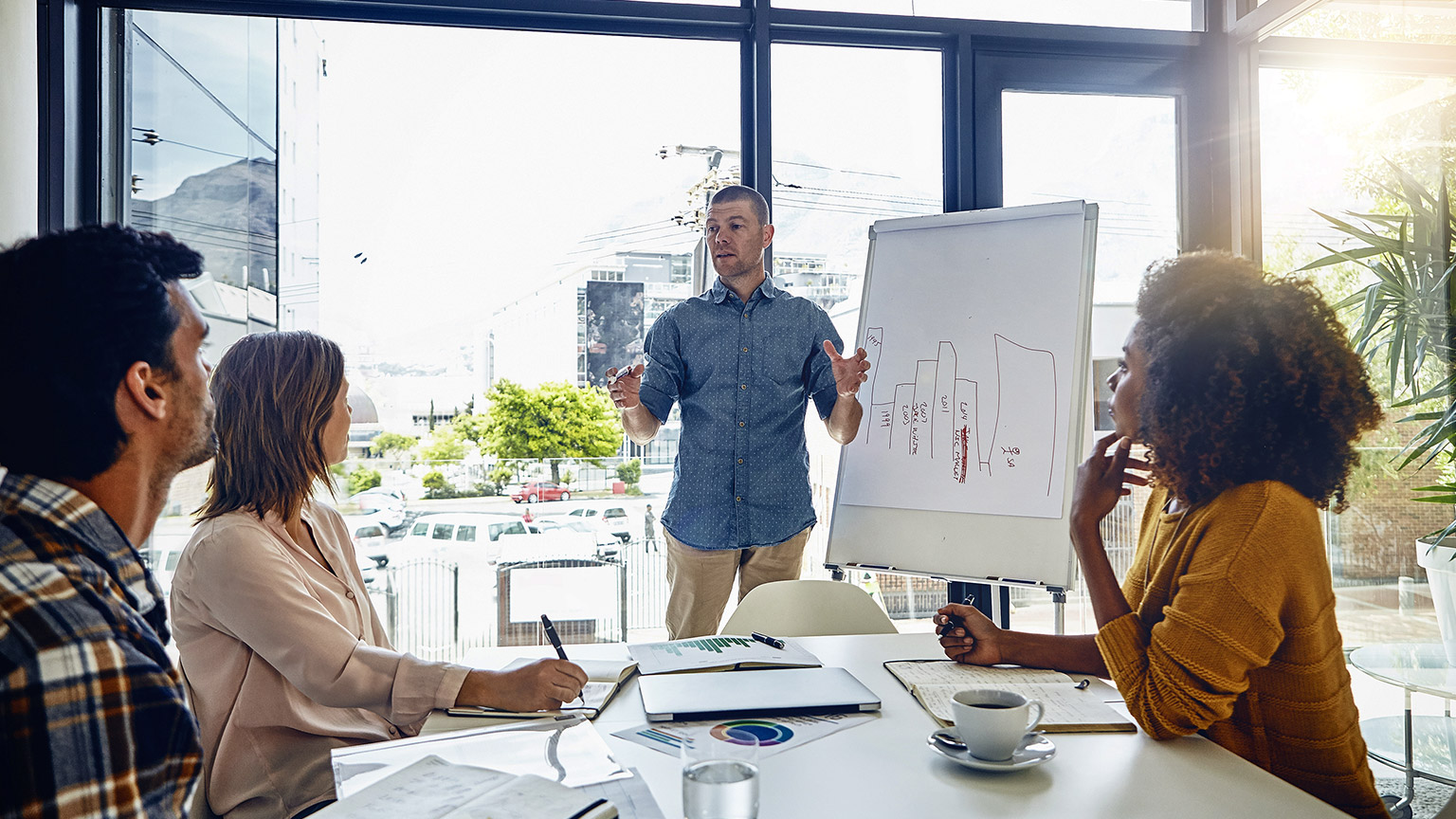 Boardroom, talking and seminar in office with management people, data and retail for discussion feedback