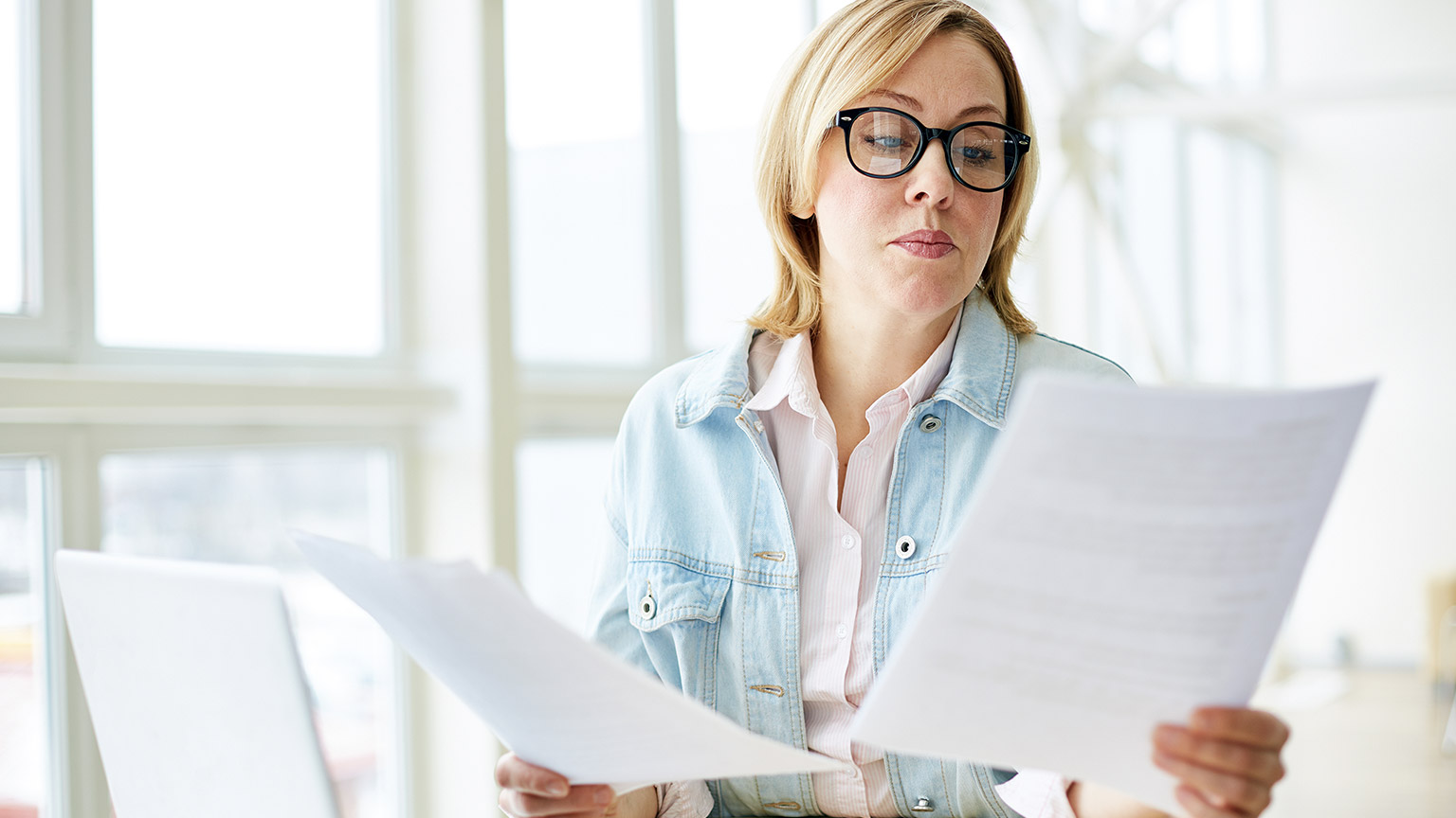 Woman reviewing document