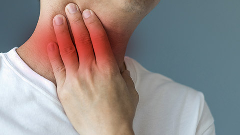 Hand of man touch his neck with red spot as sickness with pharynx inflammation disease