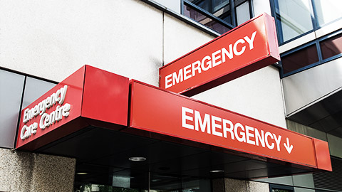 Entrance to and signage for a hospital emergency department in Melbourne, Australia