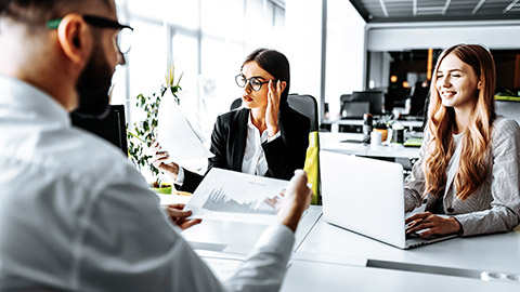 Office members sitting on a meeting