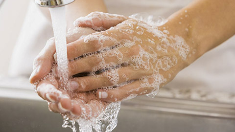 caucasian-woman-washing-her-hands