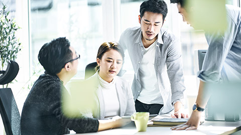 Group of young executives on a meeting