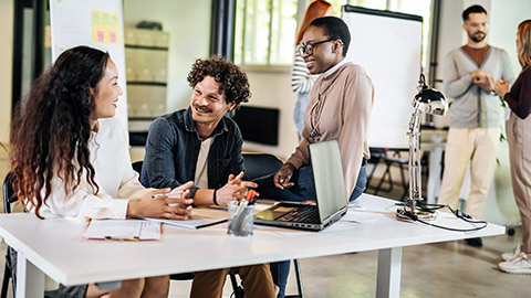 Multi-ethnic workers happy talking