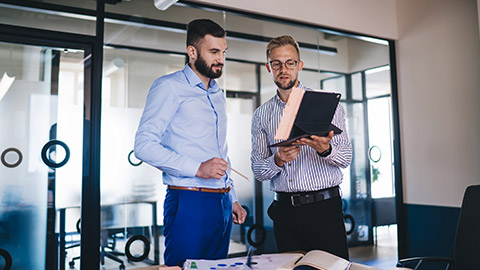 businessmen partners talking to each other communicating about