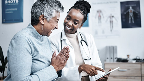 happy patient talking with doctor