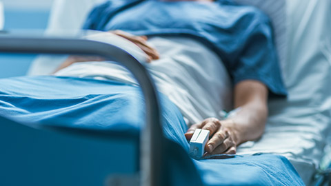 In the Hospital Sick Male Patient Sleeps on the Bed