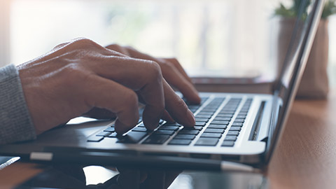 A close view of a person typing