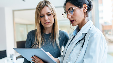 A patient and doctor talking