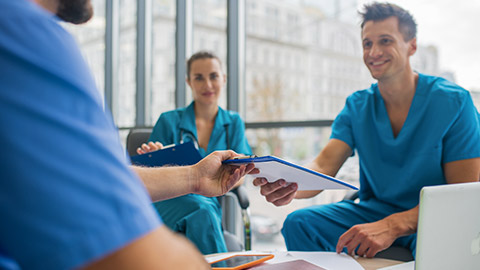 Medical workers having a meeting and sharing information