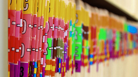 Medical files on a shelf