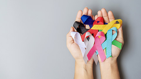 colorful awareness ribbons; blue, red, green, black, grey, white, pink and yellow color for supporting people living and illness