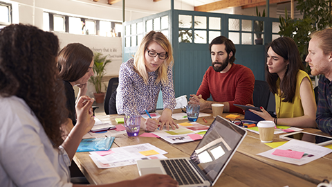 Manager Leads Brainstorming Meeting In Design Office