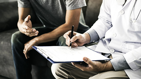 A medical professional taking down notes of an incident