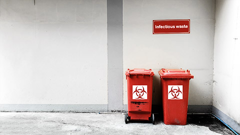 A couple of hazardous material bins