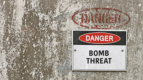 red, black and white Danger, Bomb Threat warning sign